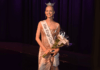 Emily Carpenter smiling on stage after being crowned Miss Kings County 2025 shortly before her passing in April 2025